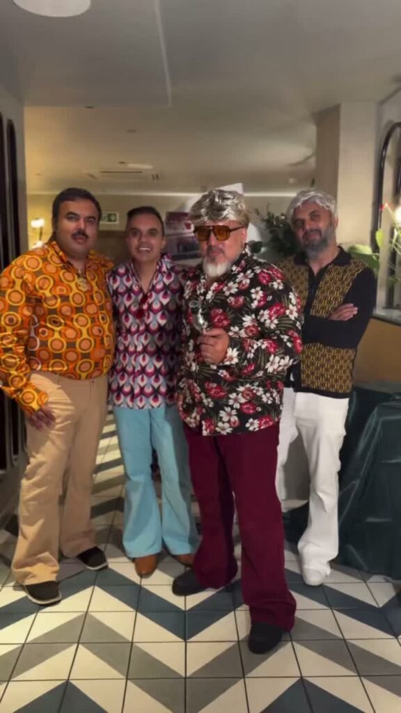 The Sanam Tandoori team dressed in 1970s style for the 50th anniversary night